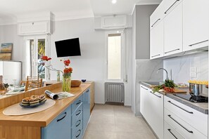 Family Apartment, Multiple Bedrooms, 2 Bathrooms (Sunny House Spiagge e Ciclabile) | Private kitchen | Fridge, stovetop, dishwasher, coffee/tea maker