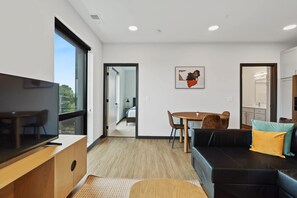 TV, offices - CozySuites Mass w/ parking, lounge & roof deck #11 (Indianapolis)