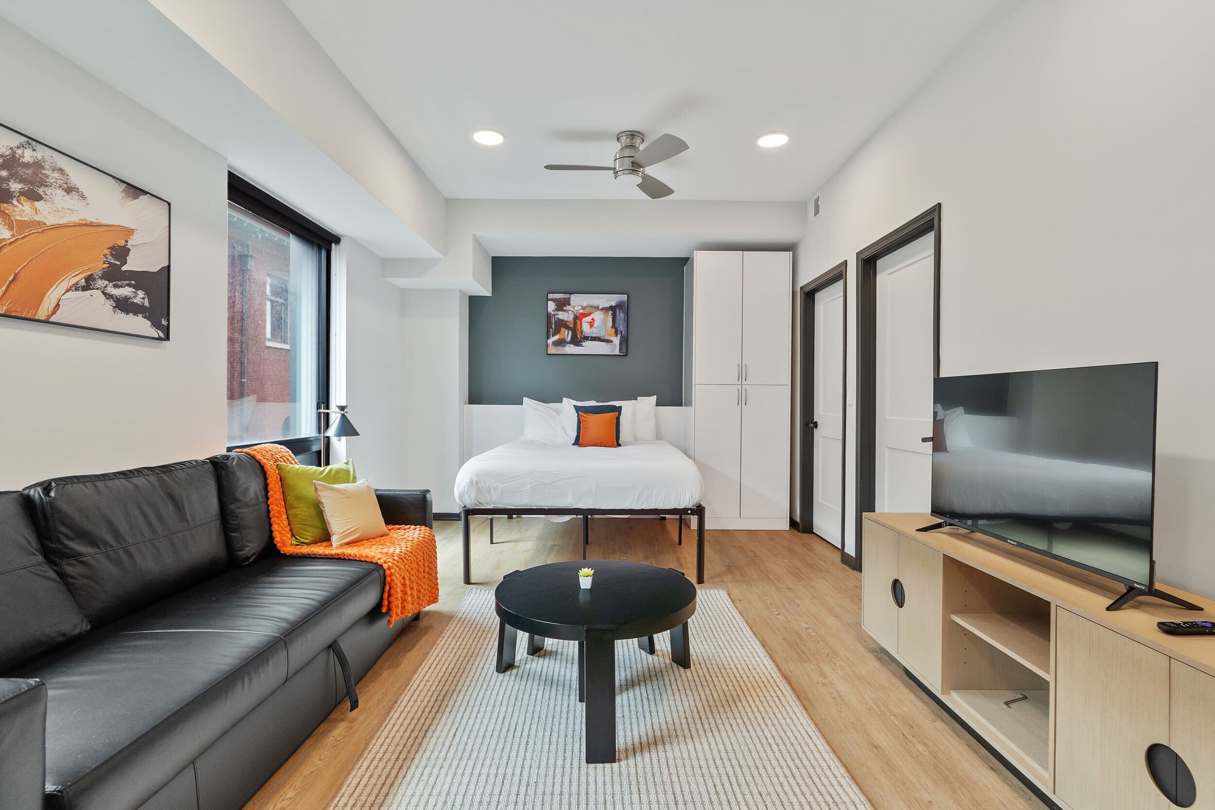 CozySuites Mass w/ parking, lounge & roof deck #14