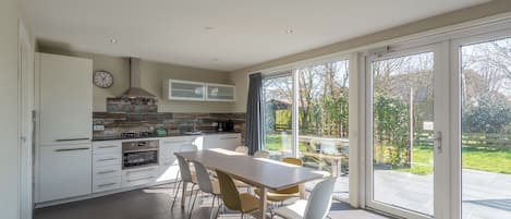 Dishwasher, toaster, dining tables