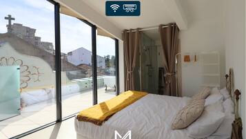 Habitación exclusiva con 1 cama matrimonial o 2 individuales, balcón, vista a la ciudad | Wifi gratis