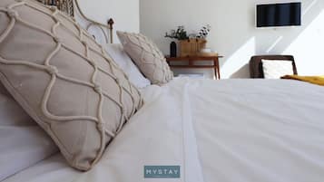Quarto casal ou duplo exclusivo, sacada, vista para a cidade | Wi-Fi de cortesia