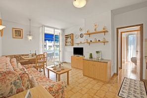 Standard Apartment, Multiple Bedrooms (Garden & Surf By Rossana) | Living area | Flat-screen TV