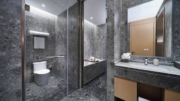 Deep-soaking bathtub, rainfall showerhead, hair dryer, bathrobes