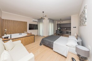 1 slaapkamer, een strijkplank/strijkijzer, wifi, beddengoed