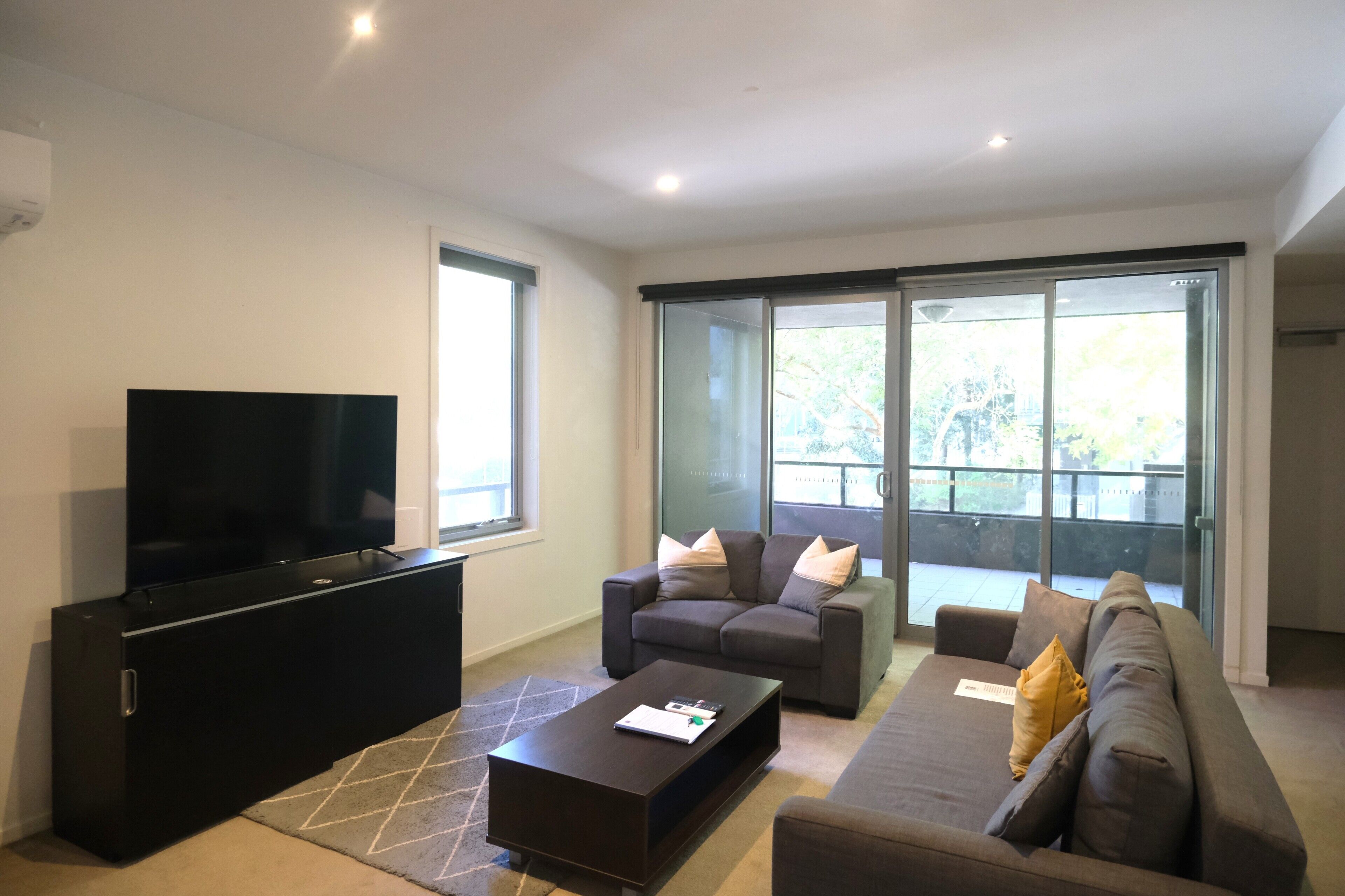 Premium Townhome, 4 Bedrooms, Courtyard View | Living area | 42-inch Smart TV with cable channels