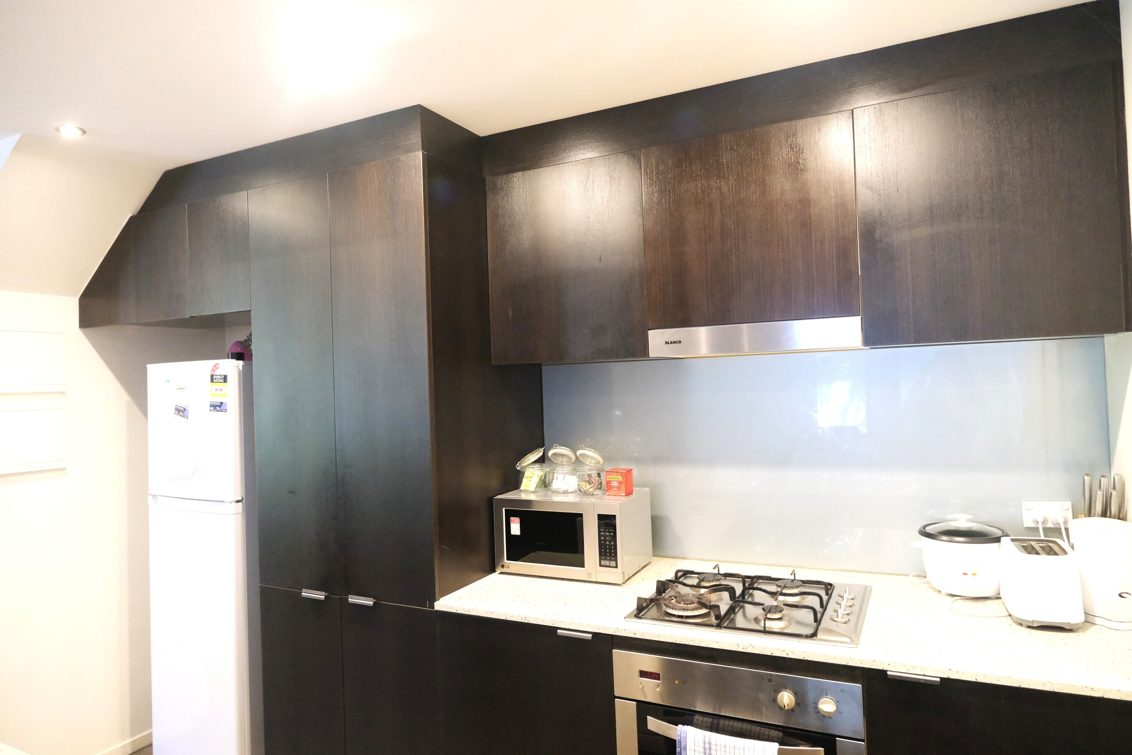 Premium Townhome, 4 Bedrooms, Courtyard View | Private kitchen | Full-sized fridge, microwave, oven, stovetop