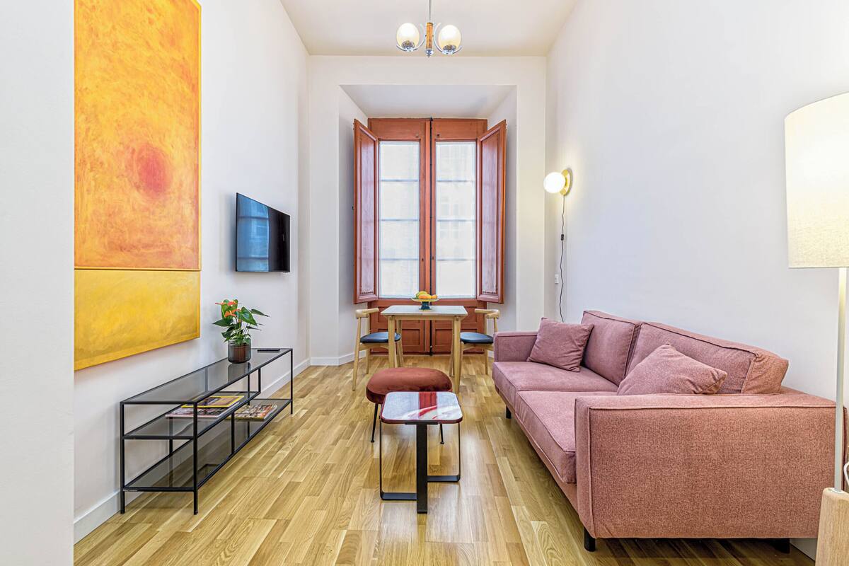 Premium Apartment, 1 Queen Bed | Living area | 50-inch flat-screen TV with cable channels