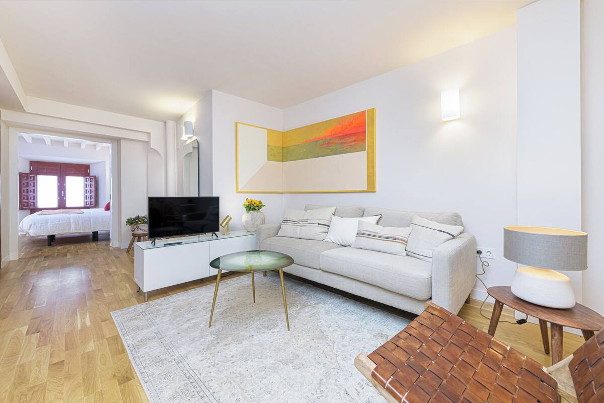 Comfort Apartment, 1 Queen Bed | Living area | 50-inch flat-screen TV with cable channels