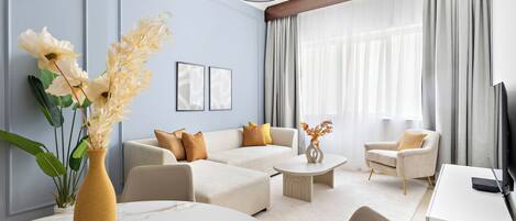 Panoramic Apartment | Living area | 50-inch Smart TV with digital channels