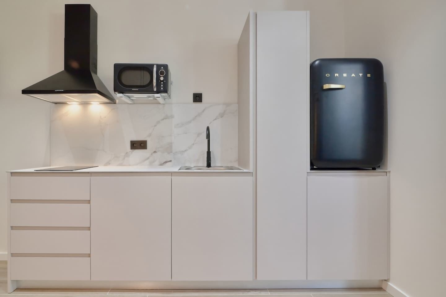 Fridge, microwave, coffee/tea maker, toaster