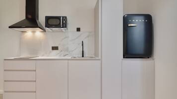 Fridge, microwave, coffee/tea maker, toaster