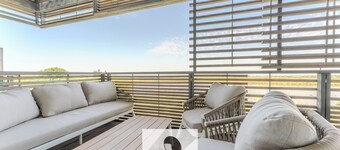Luxury building with pond view and parking