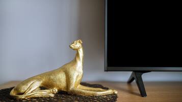 Lägenhet City - utsikt mot staden | Vardagsrum | Platt-tv