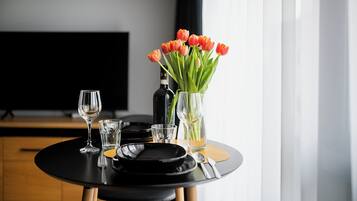 Apartamento City, vistas a la ciudad | Zona de estar | Una televisión de pantalla plana