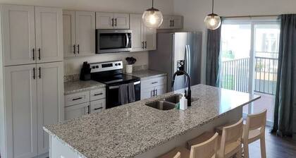 Modern Omaha Getaway with Private Deck & Free Parking