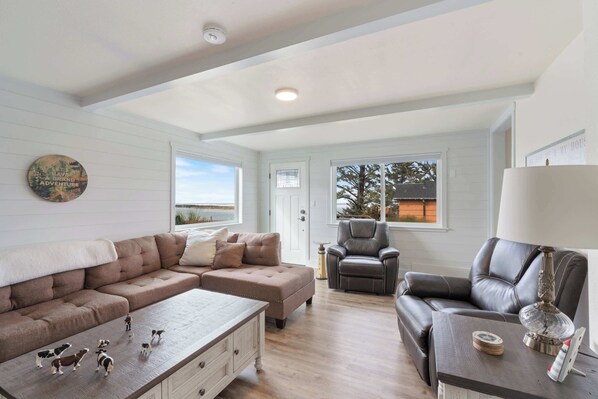 TV, fireplace, offices - Navigate Stays: Waterfront w/ Bay Views & More (Tillamook)