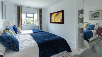 Premium bedding, down duvets, memory-foam beds, individually decorated