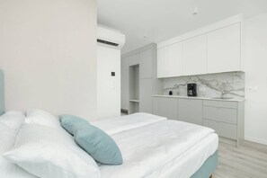 2 habitaciones, tabla de planchar con plancha, wifi y ropa de cama 