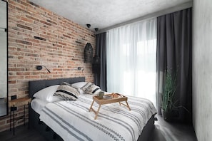 Apartamento urbano, sacada, vista para a cidade | 1 quarto, ferros/tábuas de passar roupa, Wi-Fi de cortesia