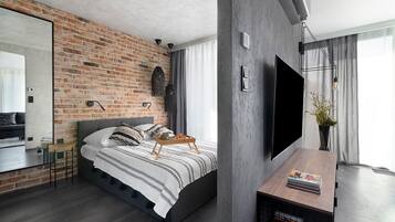 Apartament urbà, balcó, vistes a la ciutat | 1 dormitori, planxa i posts de planxar i wifi gratuïta