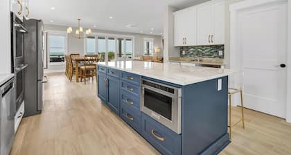 Beautiful Oceanfront Just Built 5 bedroom 5 1/2 bath home in Private Community.