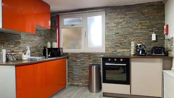 Apartment | Private kitchen | Fridge, microwave, oven, stovetop