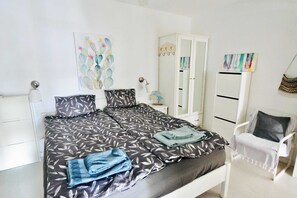 3 habitaciones, tabla de planchar con plancha, cuna de viaje y wifi 