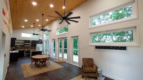 This stylish, modern country home is perfect for a getaway in Summertown, TN.
