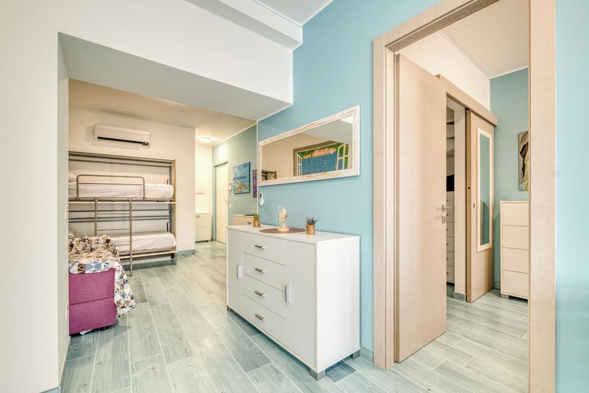 Familie appartement, meerdere slaapkamers, uitzicht op zee (Merlo E - town center & private) | 1 slaapkamer, beddengoed