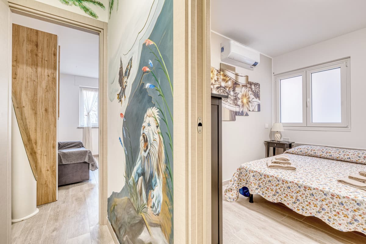 Familie appartement, meerdere slaapkamers, uitzicht op zee (Merlo C - town center & private) | 1 slaapkamer, beddengoed