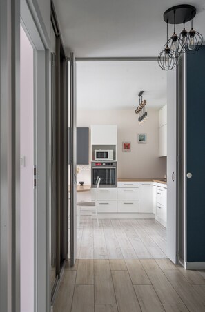 Design Apartment, 2 Bedrooms, Balcony | Living area | Flat-screen TV