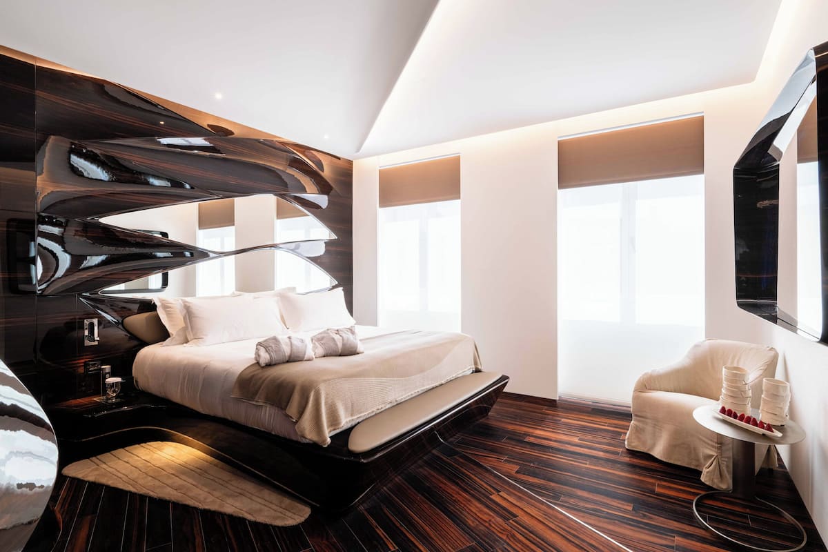 Junior Suite | 2 bedrooms, premium bedding, down duvets, minibar