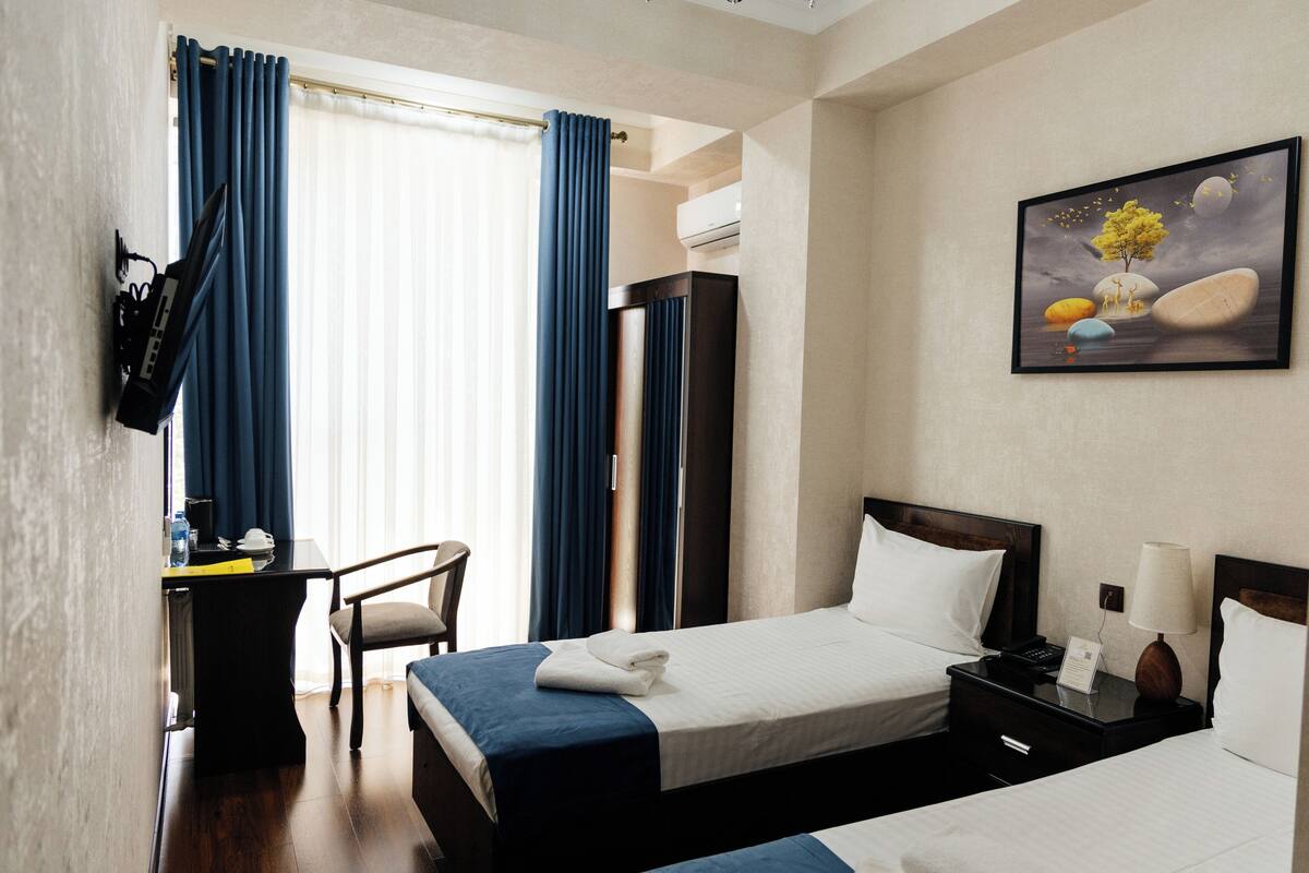 Standard Double or Twin Room | Select Comfort beds, desk, laptop workspace, blackout drapes