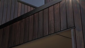A modern building with a large window and a sloped roof. - Bendigo Lodges (Bendigo)