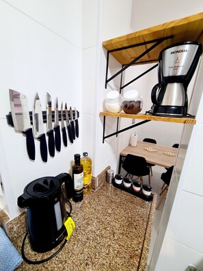 Fridge, microwave, stovetop, coffee/tea maker