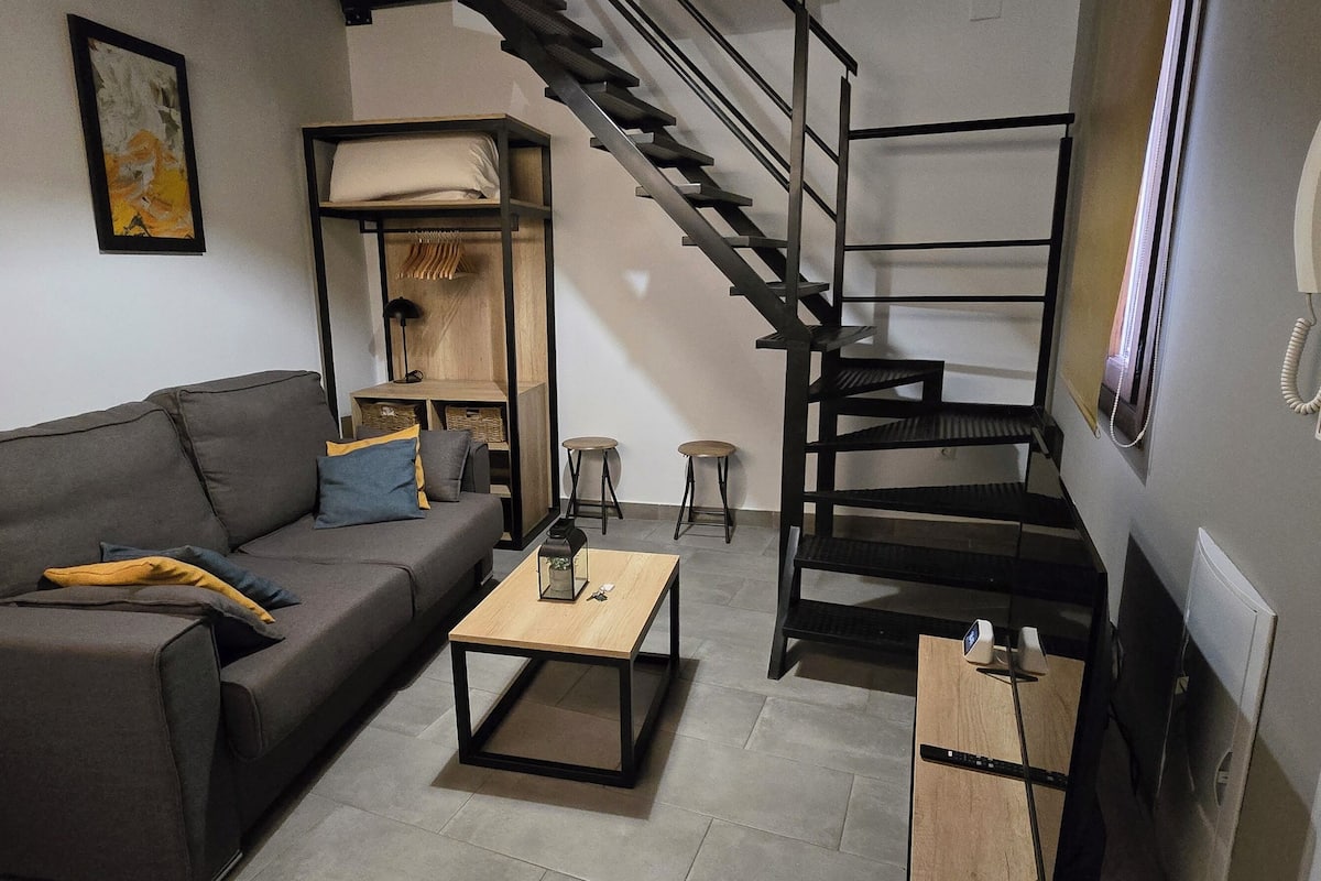 Duplex, 1 Queen Bed with Sofa bed | Living area | 50-inch TV with digital channels, smart speakers