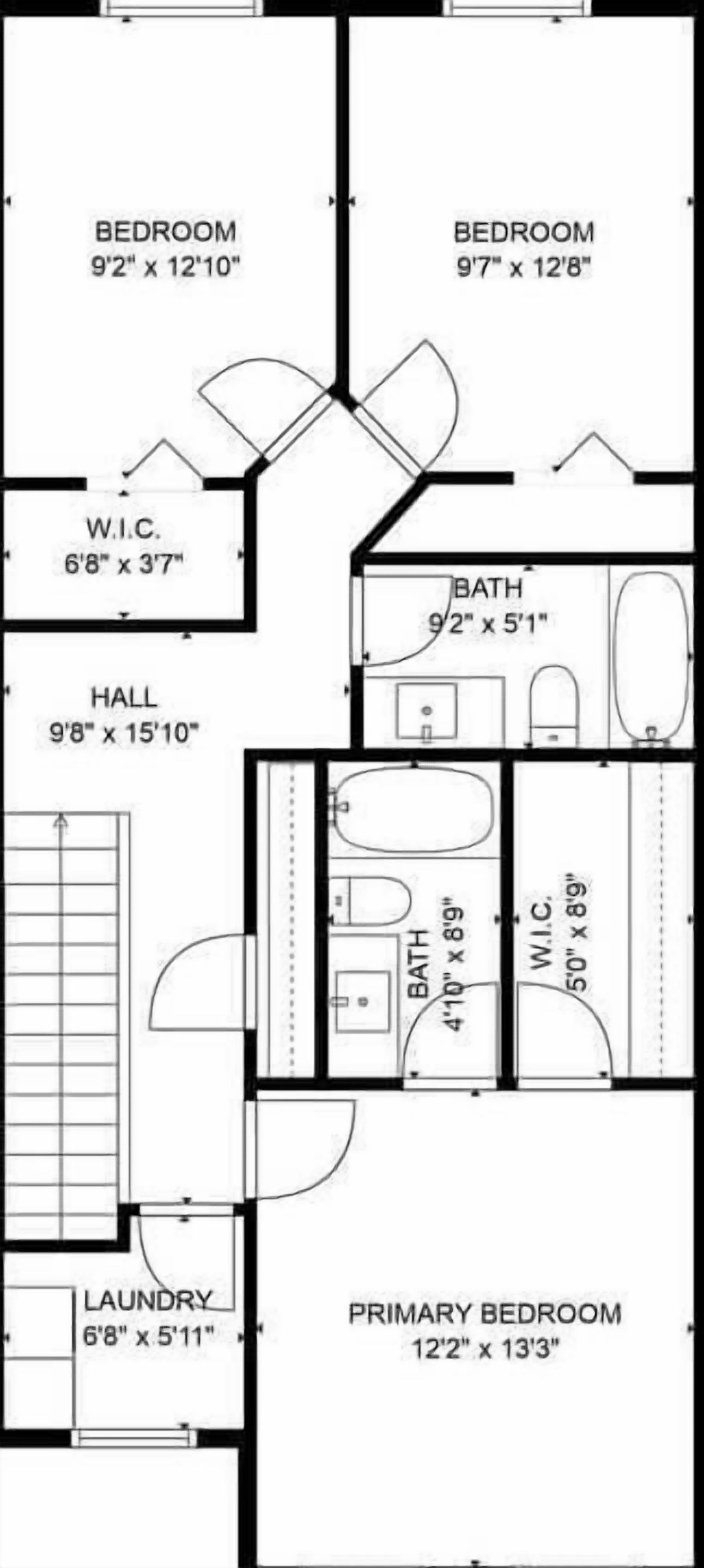 A floor plan with a primary bedroom, two bedrooms, a bathroom, a W.C., a hall, and a laundry room.
