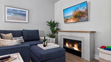 Smart TV, fireplace, foosball