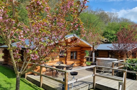 Outdoor dining. Lodge 1 - a lodge that sleeps 4 guests in 1 bedroom