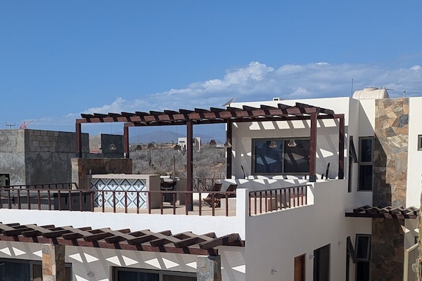 Penthouse Studio with rooftop deck at the second level of Casa Arena