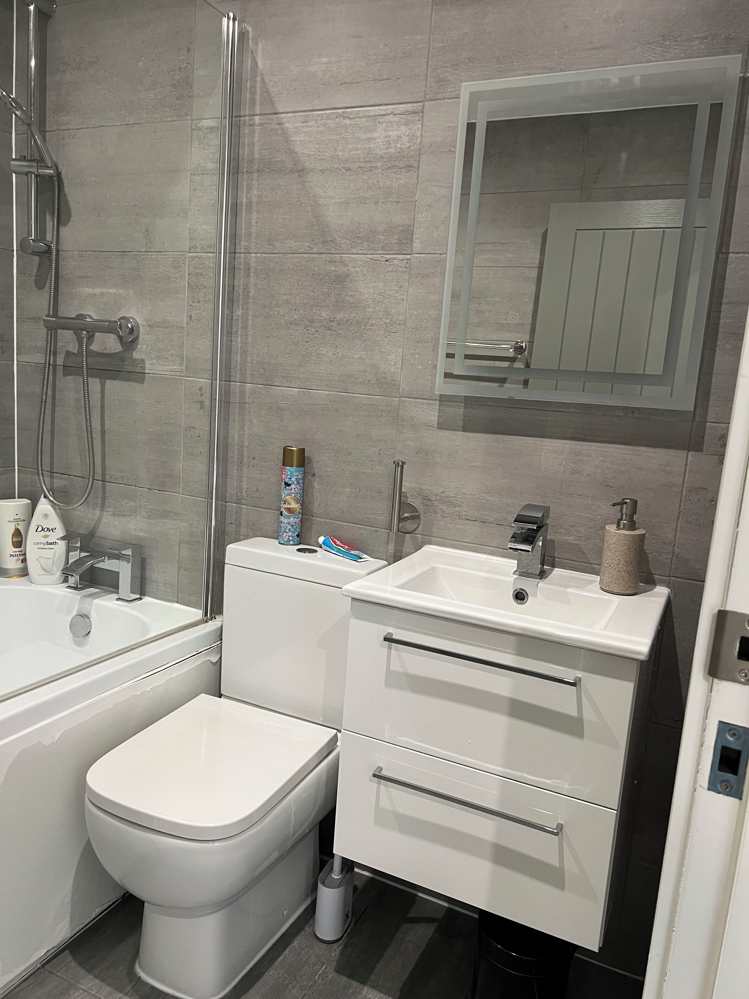 Hair dryer, towels, soap, shampoo