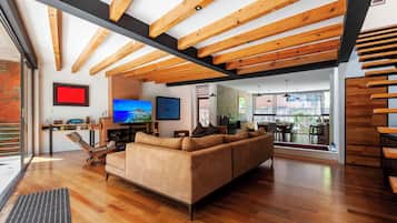 Luxury House, Lake View | Living area | 50-inch flat-screen TV with digital channels
