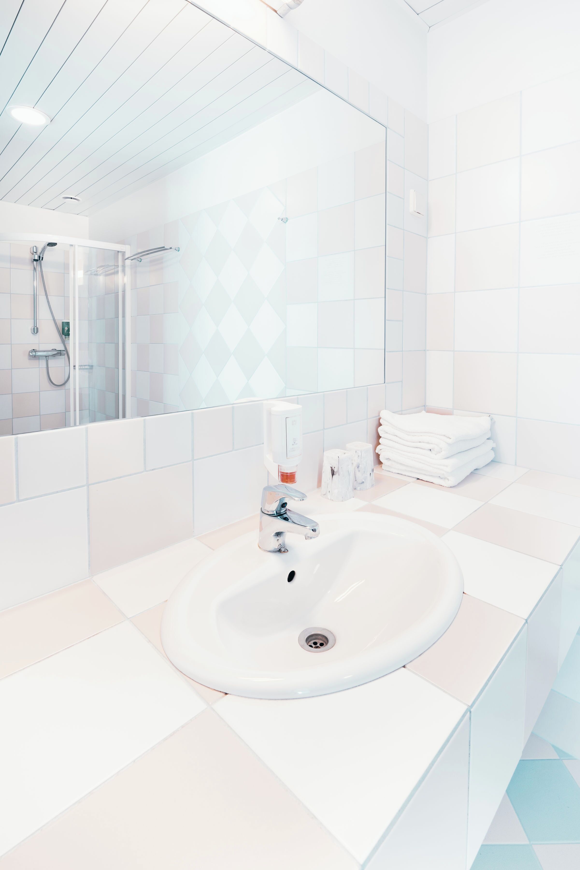 Family Quadruple Room, Park View | Bathroom | Shower, hair dryer, heated floors, towels