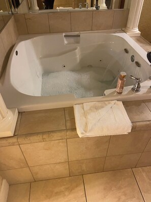 Jetted bath, hair dryer, towels, soap