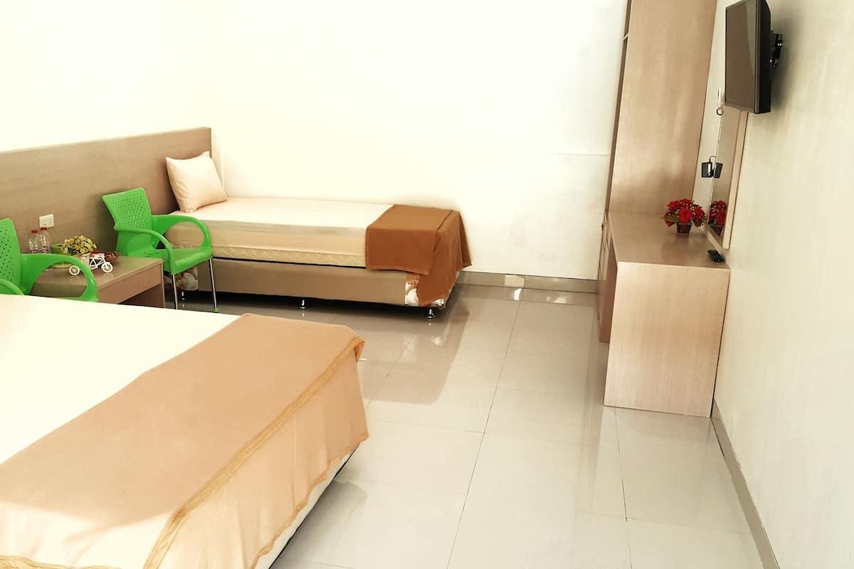 Habitación individual Deluxe, vista al parque | Escritorio, camas extra, wifi gratis y ropa de cama