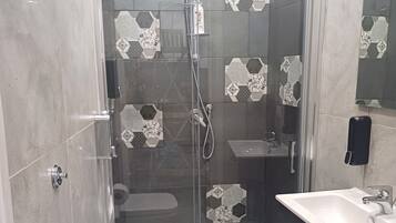 Hair dryer, towels, soap, toilet paper