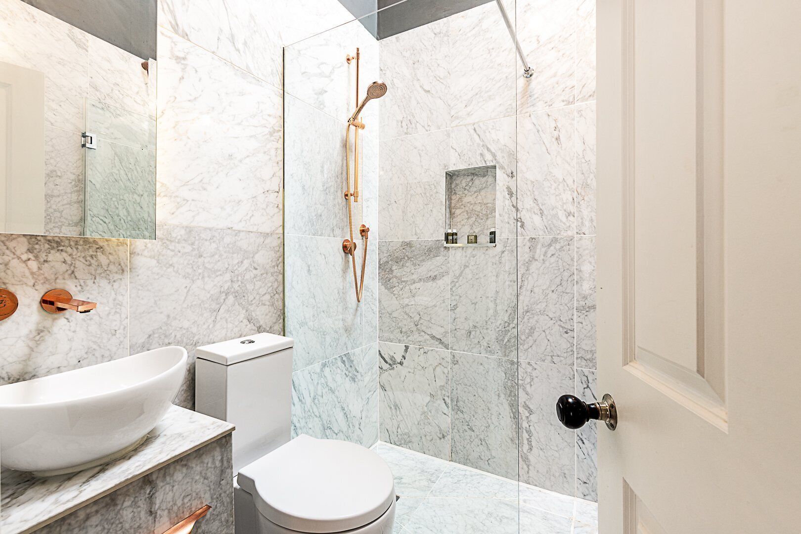Shower, eco-friendly toiletries, hair dryer, towels