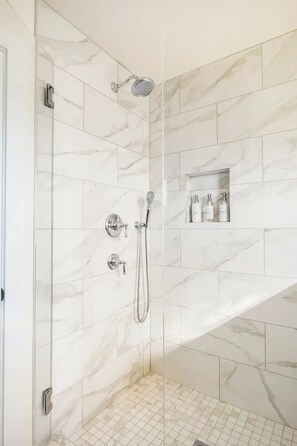 Shower, hair dryer, towels, soap