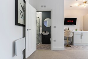 Hair dryer, towels, soap, toilet paper